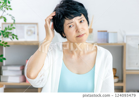 Middle-aged women suffering from skin problems 124093479