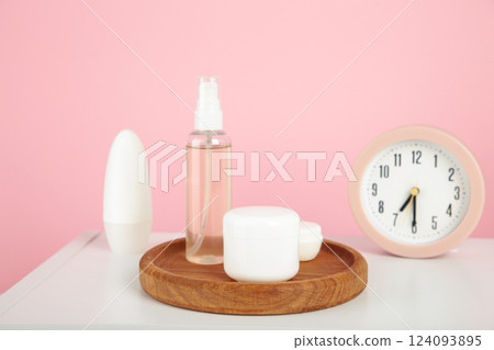 Natural cosmetic products on pink background. Cream, mask, lotion for face on table. Natural cosmetic products on pink background. Cream, mask, lotion for face on table. 124093895