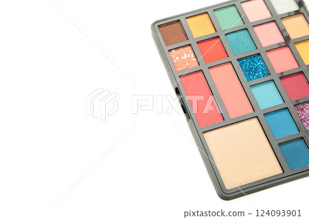 Eye shadows in different colors for fashionable professional trendy makeup. Shadow palette isolated on white background Eye shadows in different colors for fashionable professional trendy makeup. Shadow palette isolated on white background 124093901
