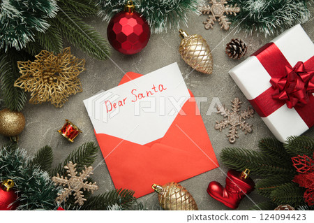 Dear Santa - letter to Santa Claus with Christmas toys on grey background. 124094423
