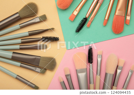 Set of makeup brushes on colorful background. 124094435
