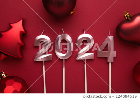 2024 Happy New Year and Christmas decoration on red background 124094519