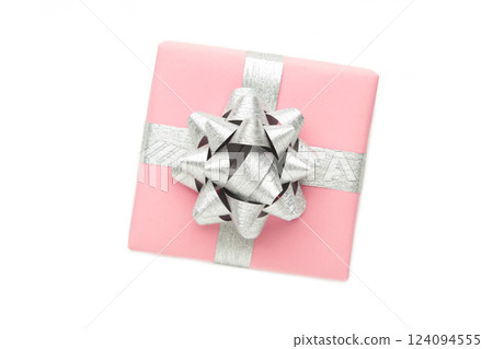 Pink gift box with silver bow isolated on white background. 124094555