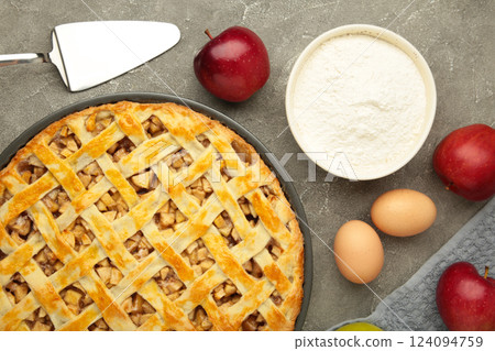 Cooking baking concept. Making American apple pie on table with ingredients 124094759