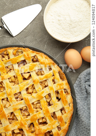 Cooking baking concept. Making American apple pie on table with ingredients Cooking baking concept. Making American apple pie on table with ingredients 124094817