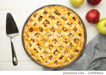 Homemade sweet american apple pie with sugar and cinnamon. Tart on white background. 124094822