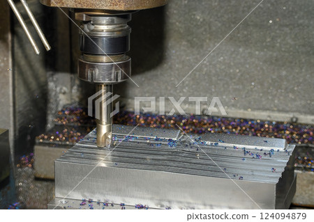 The CNC milling machine rough cutting the injection mold parts by indexable tools. T 124094879