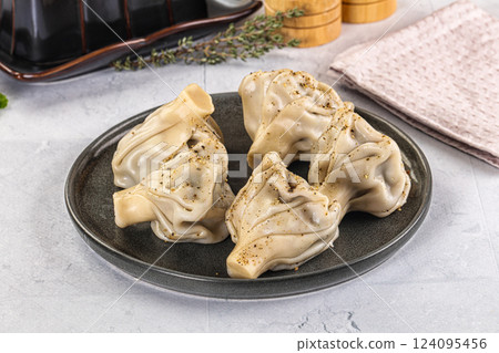 Georgian stuffed meat dumplings Khinkali 124095456