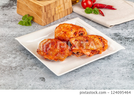Baked marinated crispy chicken tighs Baked marinated crispy chicken tighs 124095464