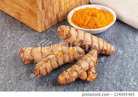 Fresh aroma tumeric roots heap Fresh aroma tumeric roots heap 124095465