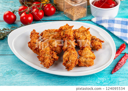 Golden crispy fried chicken strips Golden crispy fried chicken strips 124095534