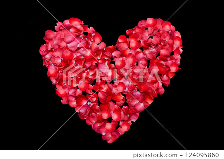 The heart is a shape of red rose petals isolated on a black background. A symbol of love and relationships, Valentine's day is the day of love. A stunning heart shape crafted with vibrant red rose 124095860