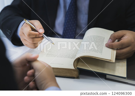 Lawyer meeting and consult with client. Consultation of businesswoman and lawyer. Treaty of the law. Law and Legal services concept. 124096300