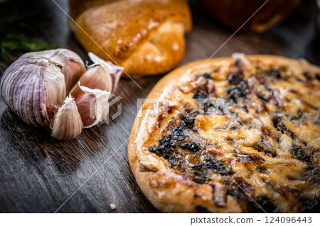 Pie and homemade bread, pizza or pie ingridients, food flat lay on kitchen table background. Working with butter, milk, yeast, flour, eggs, sugar pastry or bakery cooking. Text space 124096443