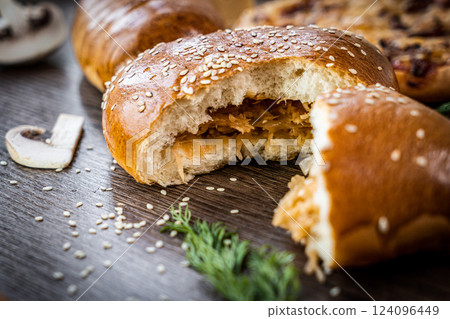 Pie and homemade bread, pizza or pie ingridients, food flat lay on kitchen table background. Working with butter, milk, yeast, flour, eggs, sugar pastry or bakery cooking. Text space 124096449