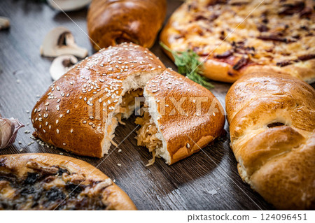 Pie and homemade bread, pizza or pie ingridients, food flat lay on kitchen table background. Working with butter, milk, yeast, flour, eggs, sugar pastry or bakery cooking. Text space Pie and homemade bread, pizza or pie ingridients, food flat lay on kitchen table background. Working with butter, milk, yeast, flour, eggs, sugar pastry or bakery cooking. Text space 124096451