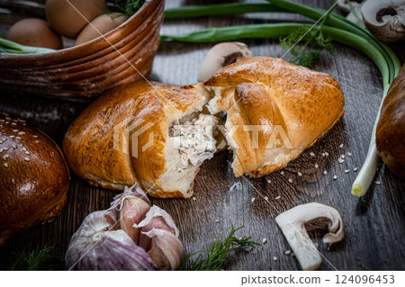 Pie and homemade bread, pizza or pie ingridients, food flat lay on kitchen table background. Working with butter, milk, yeast, flour, eggs, sugar pastry or bakery cooking. Text space 124096453