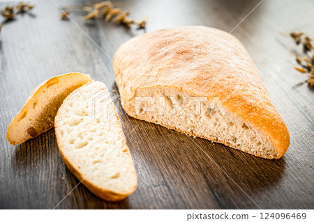 Whole Grain Healthy Sandwich Bread Square Slices, Supermarket Bread for Toasts, Soft Sandwich Loaf Pieces on wooden Background wheat bread Whole Grain Healthy Sandwich Bread Square Slices, Supermarket Bread for Toasts, Soft Sandwich Loaf Pieces on wooden Background wheat bread 124096469