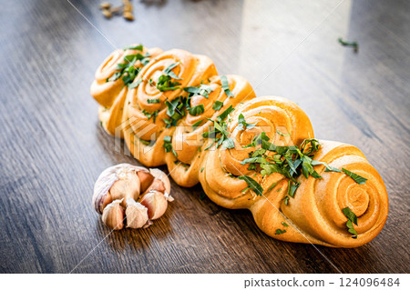 Craft sliced bread on the table at the bakery. The concept of small industries and healthy food Craft sliced bread on the table at the bakery. The concept of small industries and healthy food 124096484