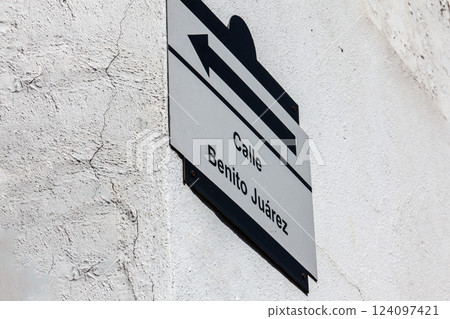 Sign of the Benito Juarez street at the beautiful colonial Magical Town of Taxco de Alarcon located in the Mexican state of Guerrero. 124097421