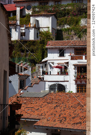 View of the beautiful colonial Magical Town of Taxco de Alarcon located in the Mexican state of Guerrero. View of the beautiful colonial Magical Town of Taxco de Alarcon located in the Mexican state of Guerrero. 124097424