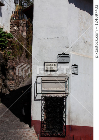 View of the beautiful colonial Magical Town of Taxco de Alarcon located in the Mexican state of Guerrero. View of the beautiful colonial Magical Town of Taxco de Alarcon located in the Mexican state of Guerrero. 124097432