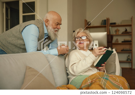 Loving senior married couple bonding and happy retirement pastime together Loving senior married couple bonding and happy retirement pastime together 124098572