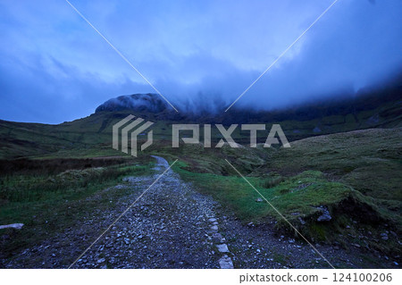rough mountain bike trail in summer 124100206