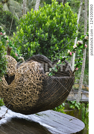 Wicker basket as a swing at Ceking Rice Terrace or Tegalalang Rice Terrace, Ubud, Bali at Indonesia 124100960