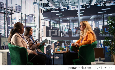 Skilled enterprise leader in a meeting strategizing with stakeholders to discuss ideas for company development. Ambitious diverse women in a men dominated business environment. Camera B. Skilled enterprise leader in a meeting strategizing with stakeholders to discuss ideas for company development. Ambitious diverse women in a men dominated business environment. Camera B. 124103078