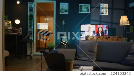 Empty contemporary studio apartment with modern decorations and equipment for a young adult, minimalist space decorated with led neon lights. Cozy urban loft with a home theatre setup. Empty contemporary studio apartment with modern decorations and equipment for a young adult, minimalist space decorated with led neon lights. Cozy urban loft with a home theatre setup. 124103243