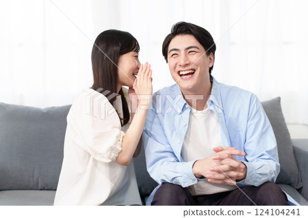 A couple talking secretly 124104241