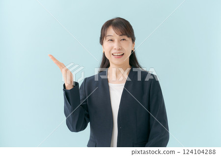 A business woman giving directions 124104288