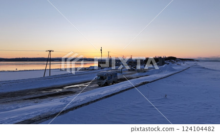 Drift ice around Lake Saroma, Hokkaido February 24, 2025 Sunset around the brackish lake Abashiri drift-ice 124104482