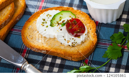 Sandwich with green cheese 124105861