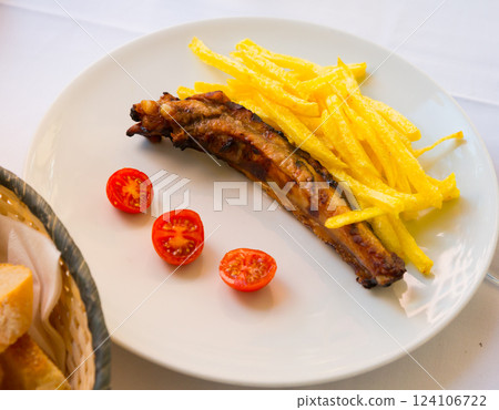Barbecued ribs with french fries 124106722