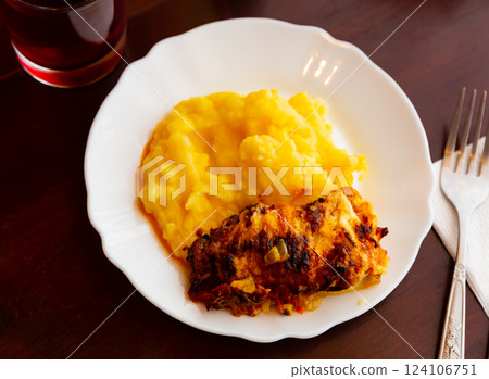 Chicken fillet with mushrooms and mashed potatoes. Russian or Belarusian cuisine Chicken fillet with mushrooms and mashed potatoes. Russian or Belarusian cuisine 124106751
