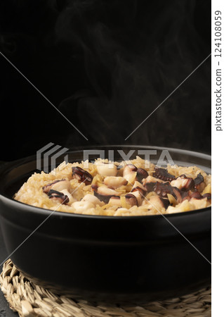 Freshly cooked steaming octopus rice 124108059
