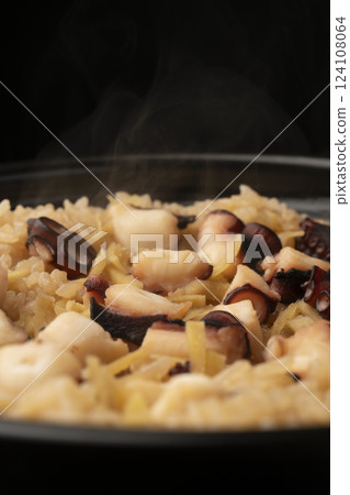 Freshly cooked steaming octopus rice 124108064