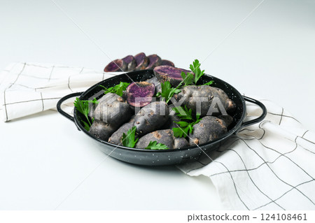 Concept of unusual vegetable - purple potato vegetable Concept of unusual vegetable - purple potato vegetable 124108461