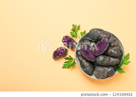 Concept of unusual vegetable - purple potato vegetable Concept of unusual vegetable - purple potato vegetable 124108482