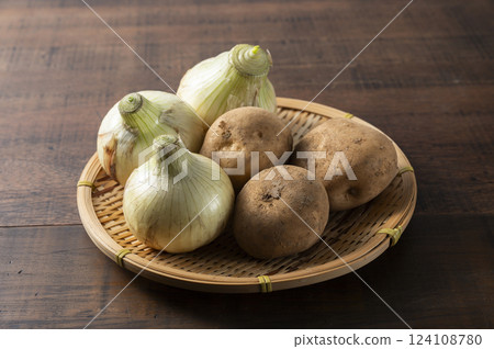 New onions and new potatoes New onions and new potatoes 124108780