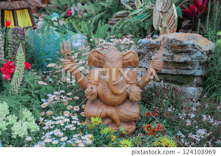 Lush Garden Pathway Surrounded by Vibrant Flowers Lush Garden Pathway Surrounded by Vibrant Flowers 124108969