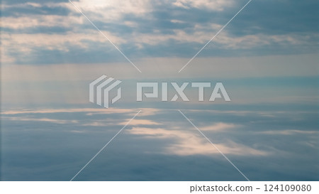 Serene Sky With Gentle Clouds and Sunlight Rays 124109080