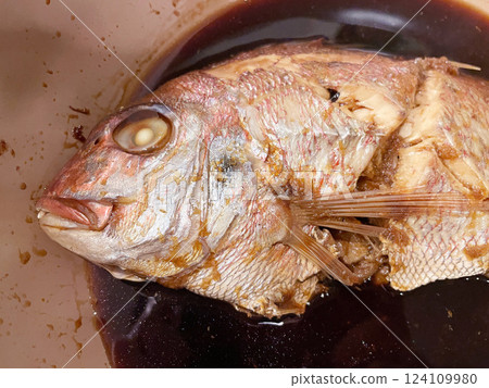Braised sea bream, a Japanese dish with a sweet and savory soy sauce base. Braised sea bream, a Japanese dish with a sweet and savory soy sauce base. 124109980