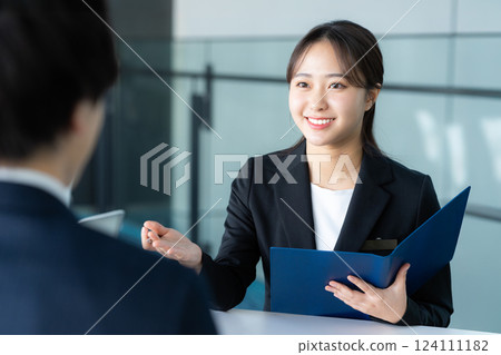 Female consultant at reception 124111182