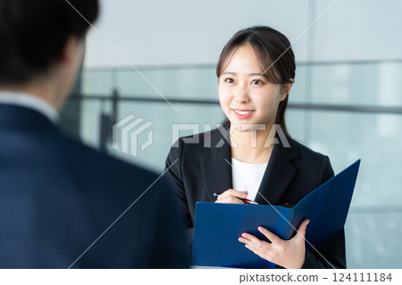 Female consultant at reception 124111184