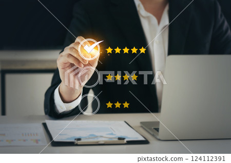 Customer Satisfaction Survey concept, 5-star satisfaction, service experience rating customer evaluation product service quality, satisfaction feedback review. 124112391