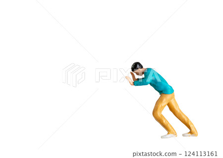 Miniature Figurine Pushing Against Invisible Force isolated on white background with clipping path Miniature Figurine Pushing Against Invisible Force isolated on white background with clipping path 124113161