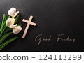Good Friday and Holy week concept - A religious cross and flower on dark stone background. 124113299